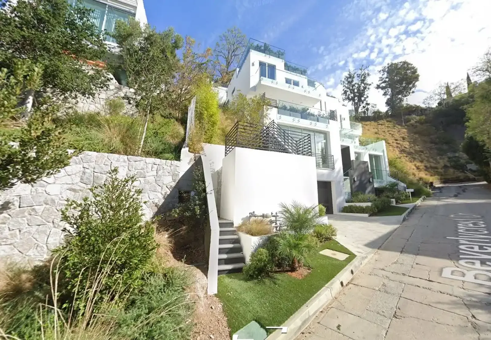 Bel Air residence entry with landscaped side yard, retaining wall and exterior stair