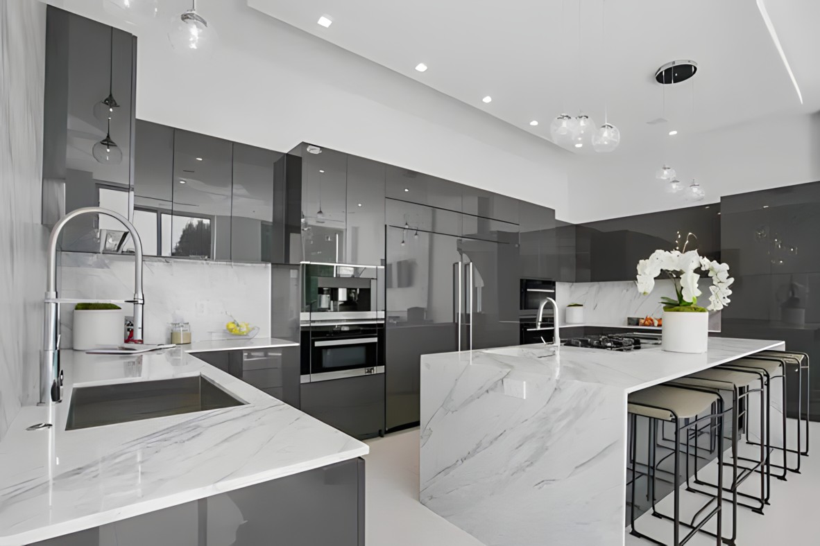 Bel Air kitchen with marble waterfall island, gloss cabinetry and bar seating