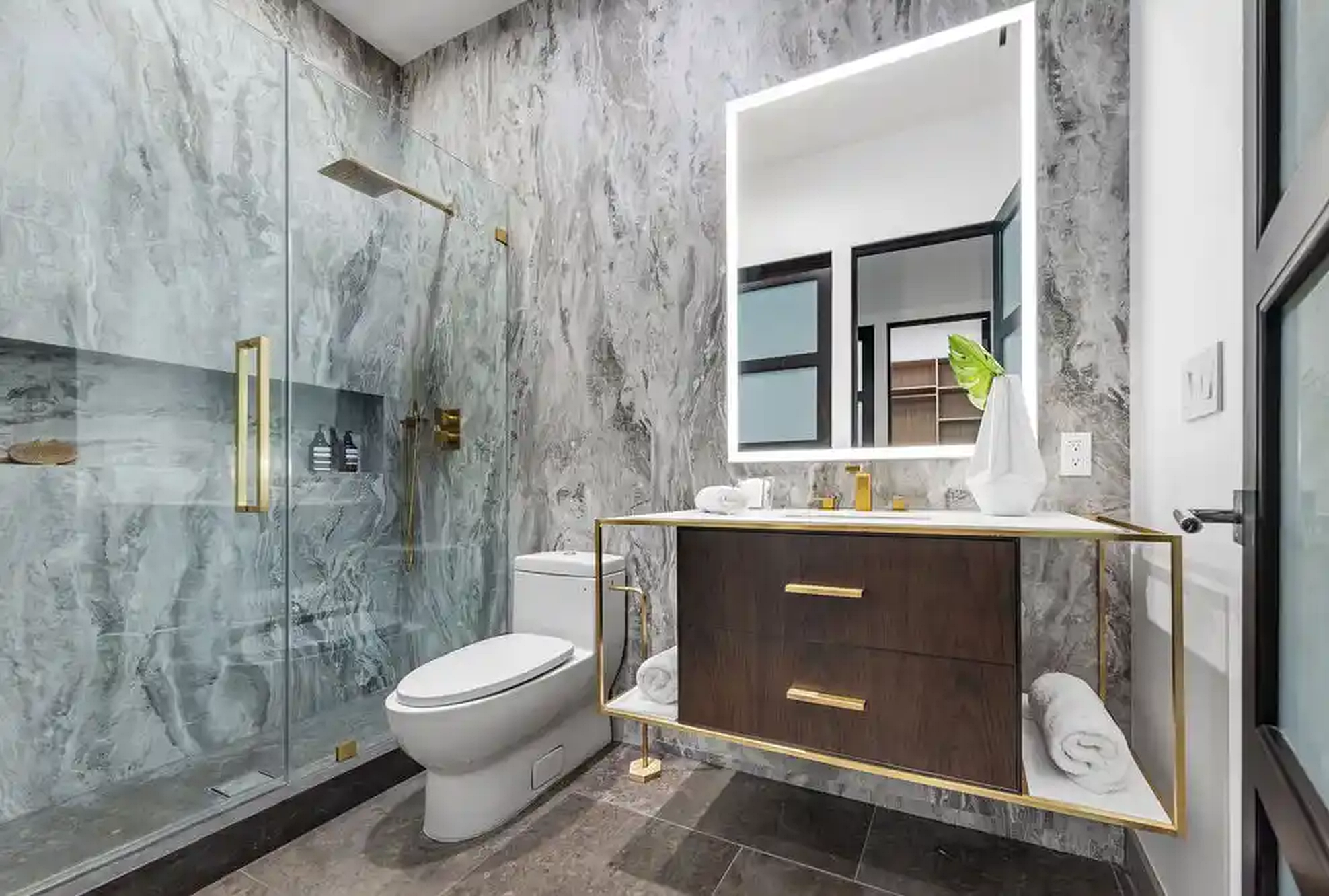 Beverly Crest marble bathroom and dark vanity