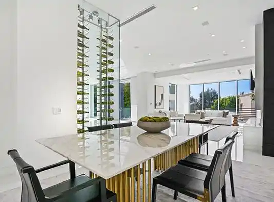 Beverly Crest dining area with suspended wine display