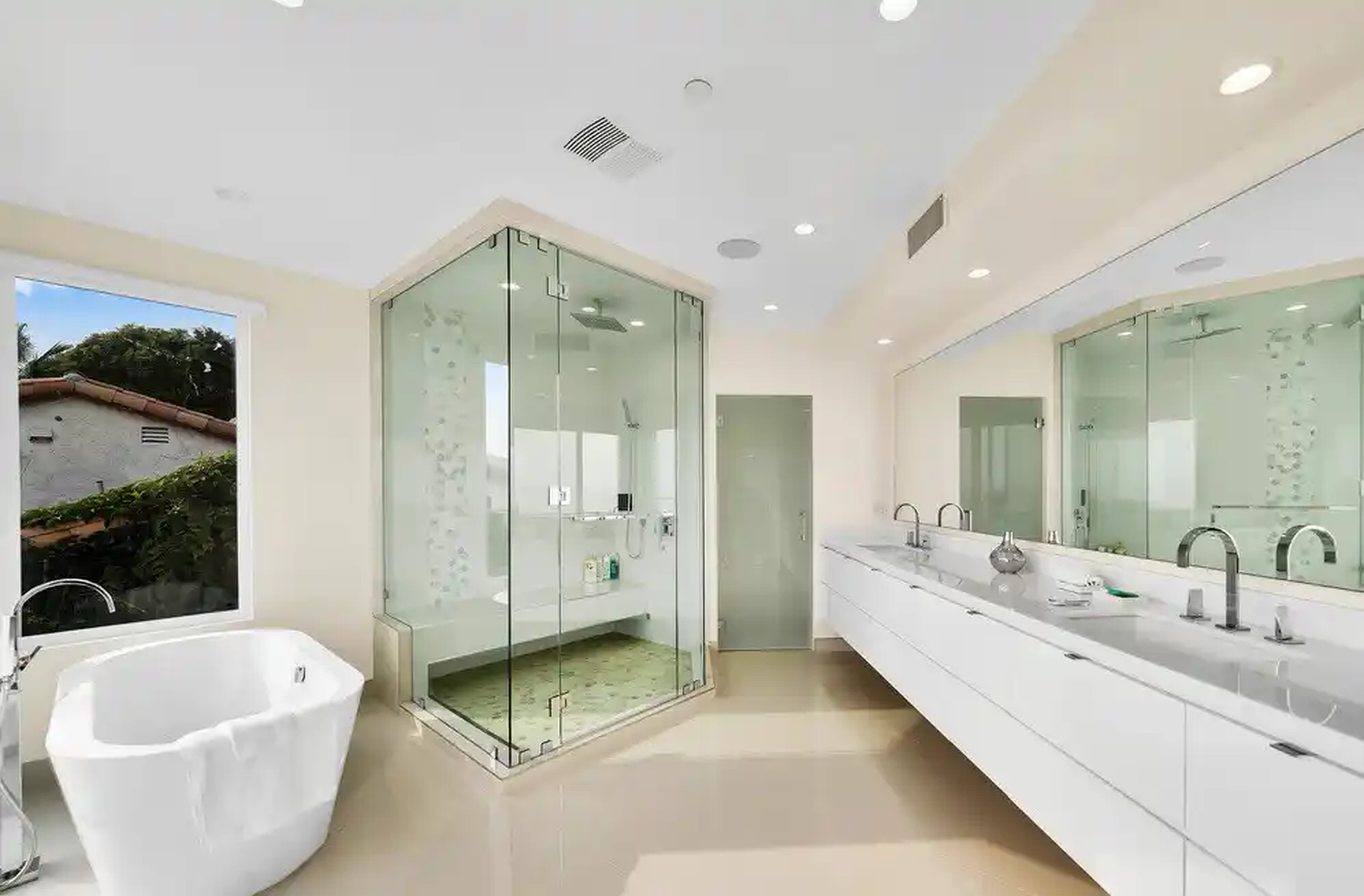 Castellamare primary bathroom with tub and shower
