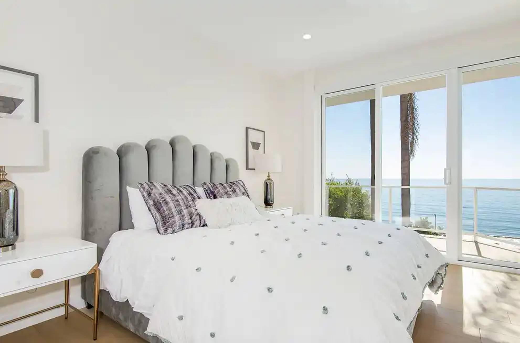 Castellamare bedroom with full-height ocean glazing