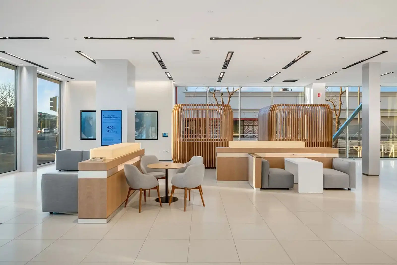 Daylit branch waiting lounge with soft seating