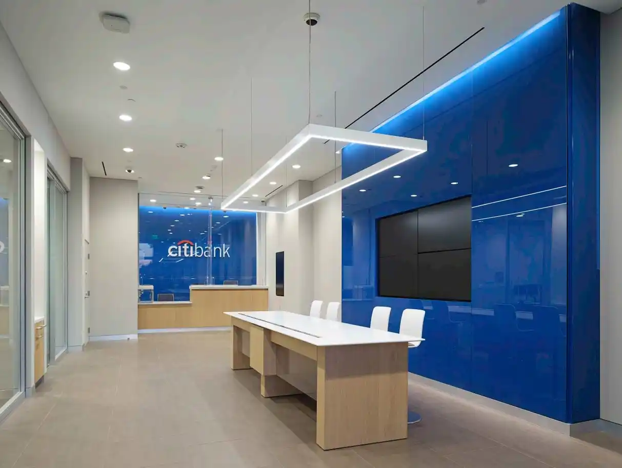 Citibank consultation table and blue feature wall
