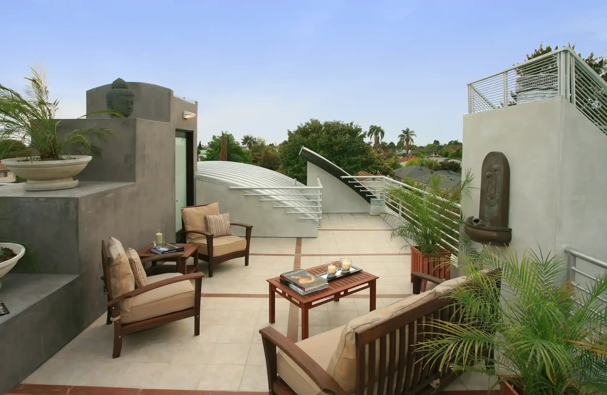 Rooftop terrace with lounge seating and planting