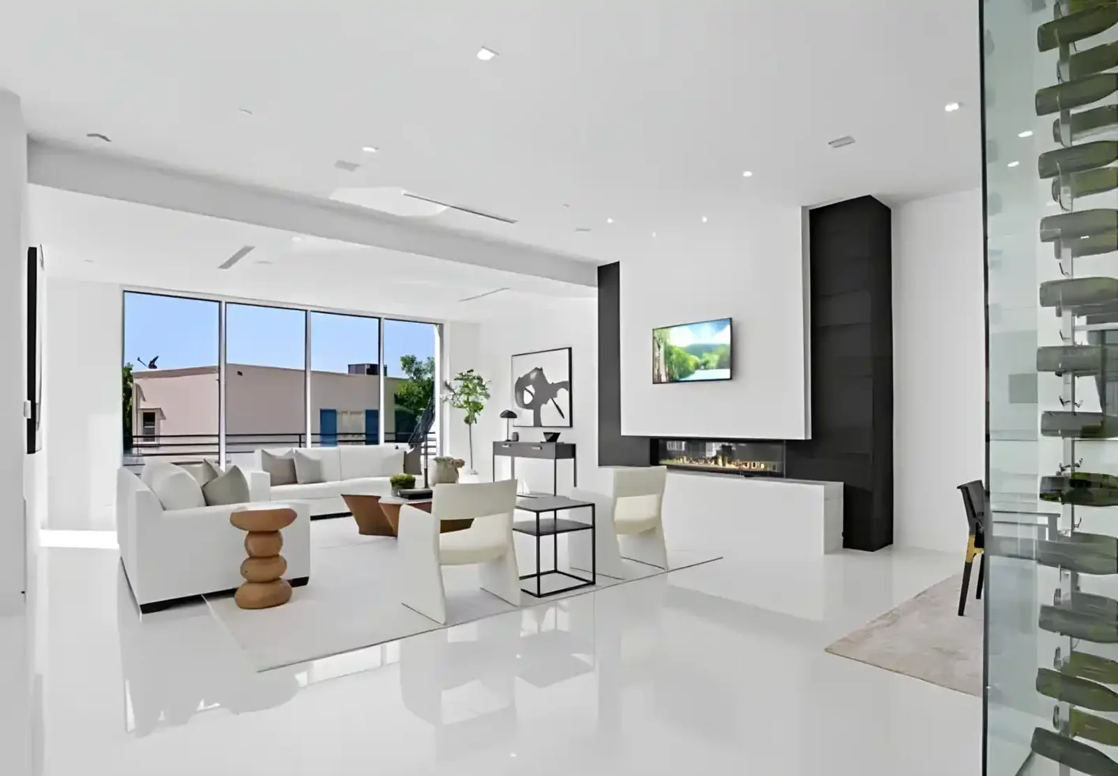 Living room with glass wine display wall