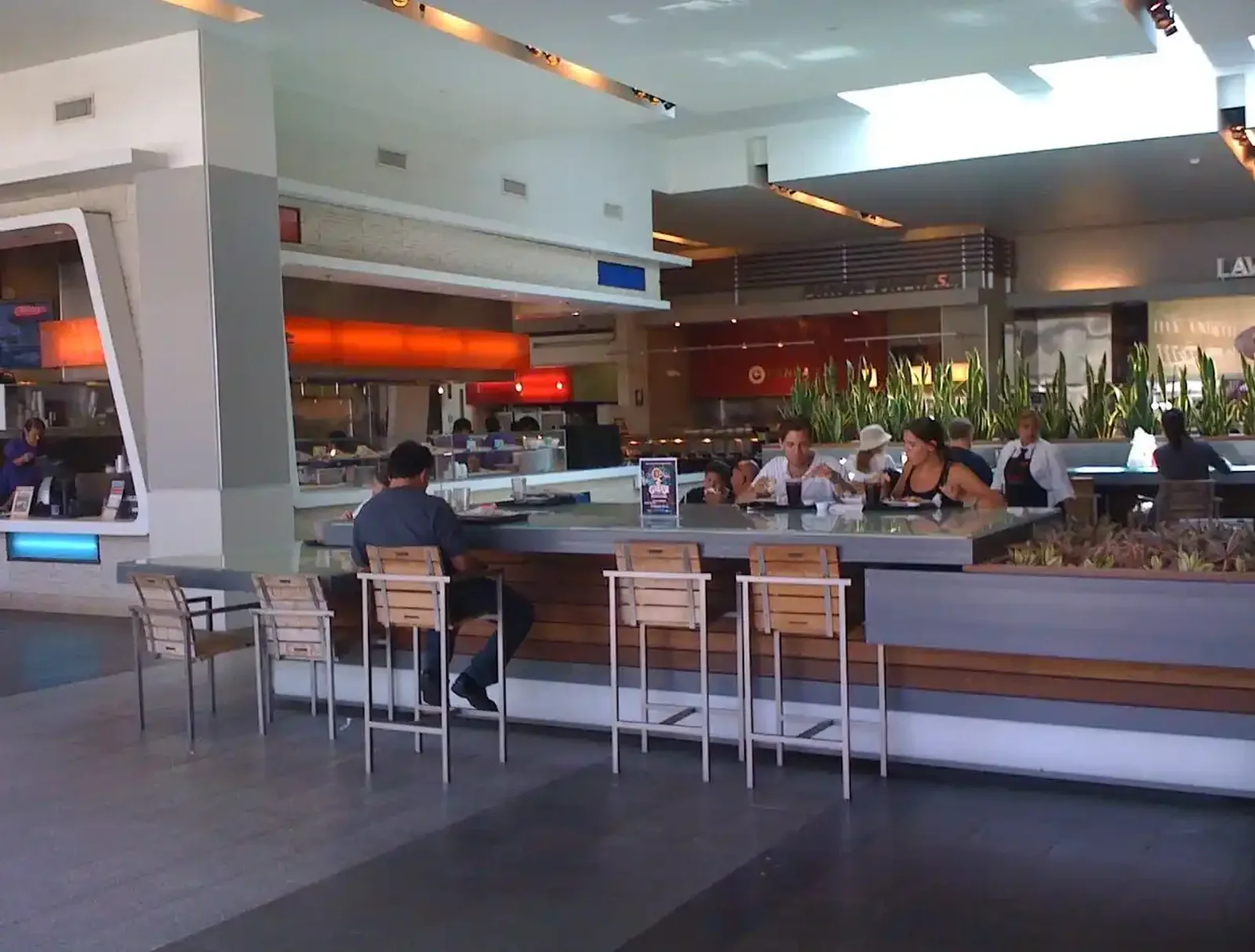 Food hall counter seating and open kitchen line