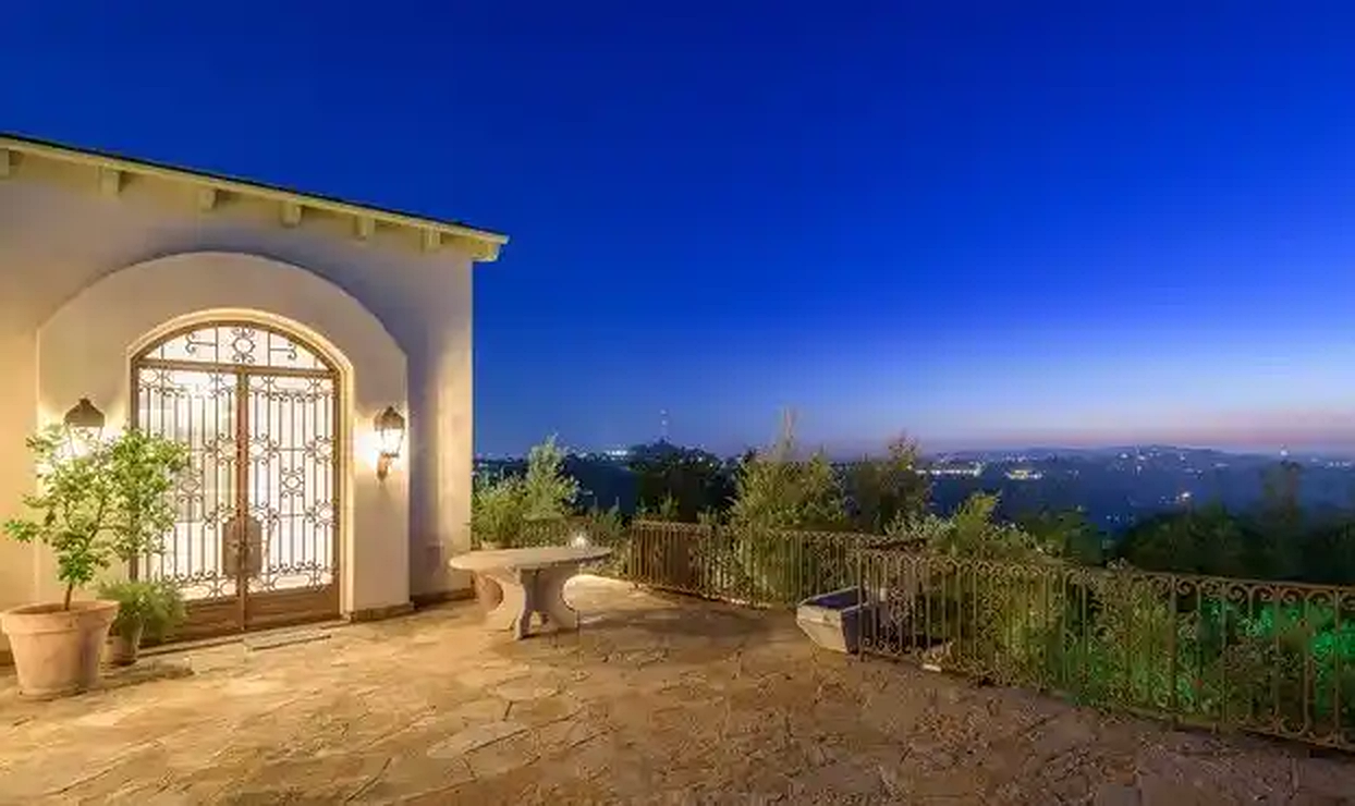 Torreyson arched entry terrace at dusk