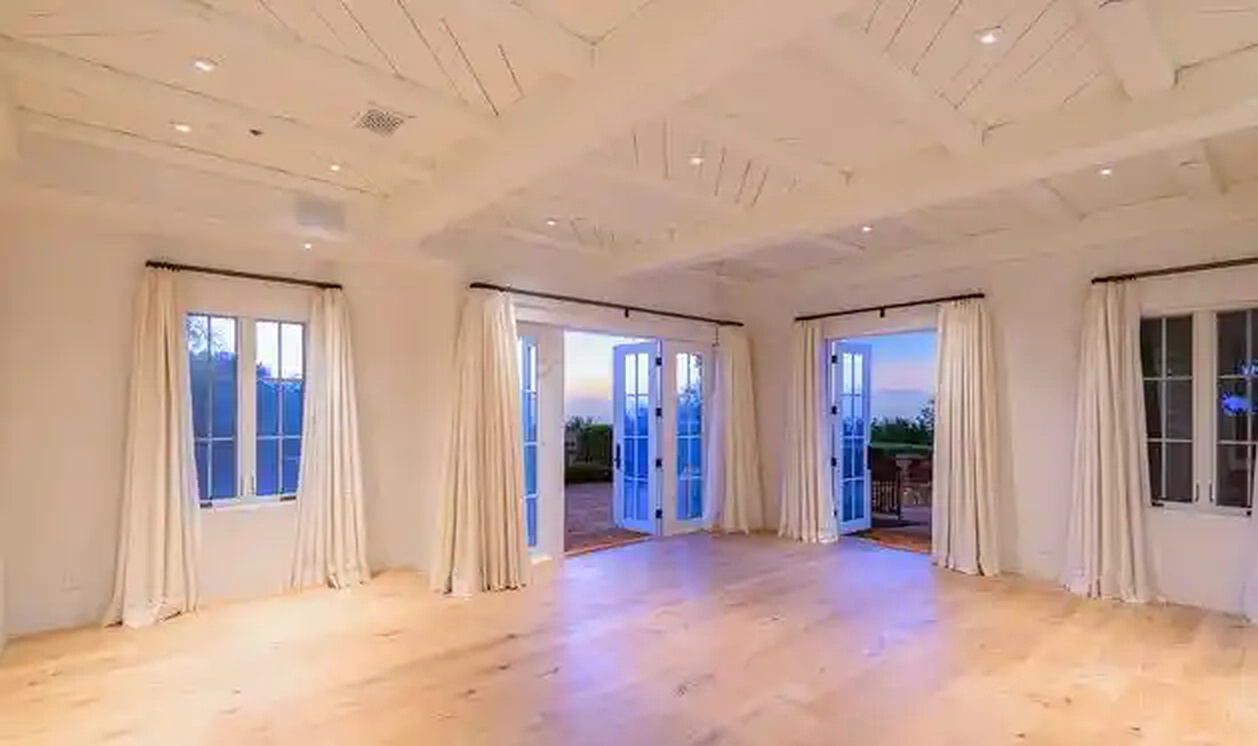 Torreyson bright interior room with French doors